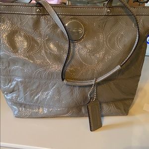 Gray Coach purse discounted due to imperfections